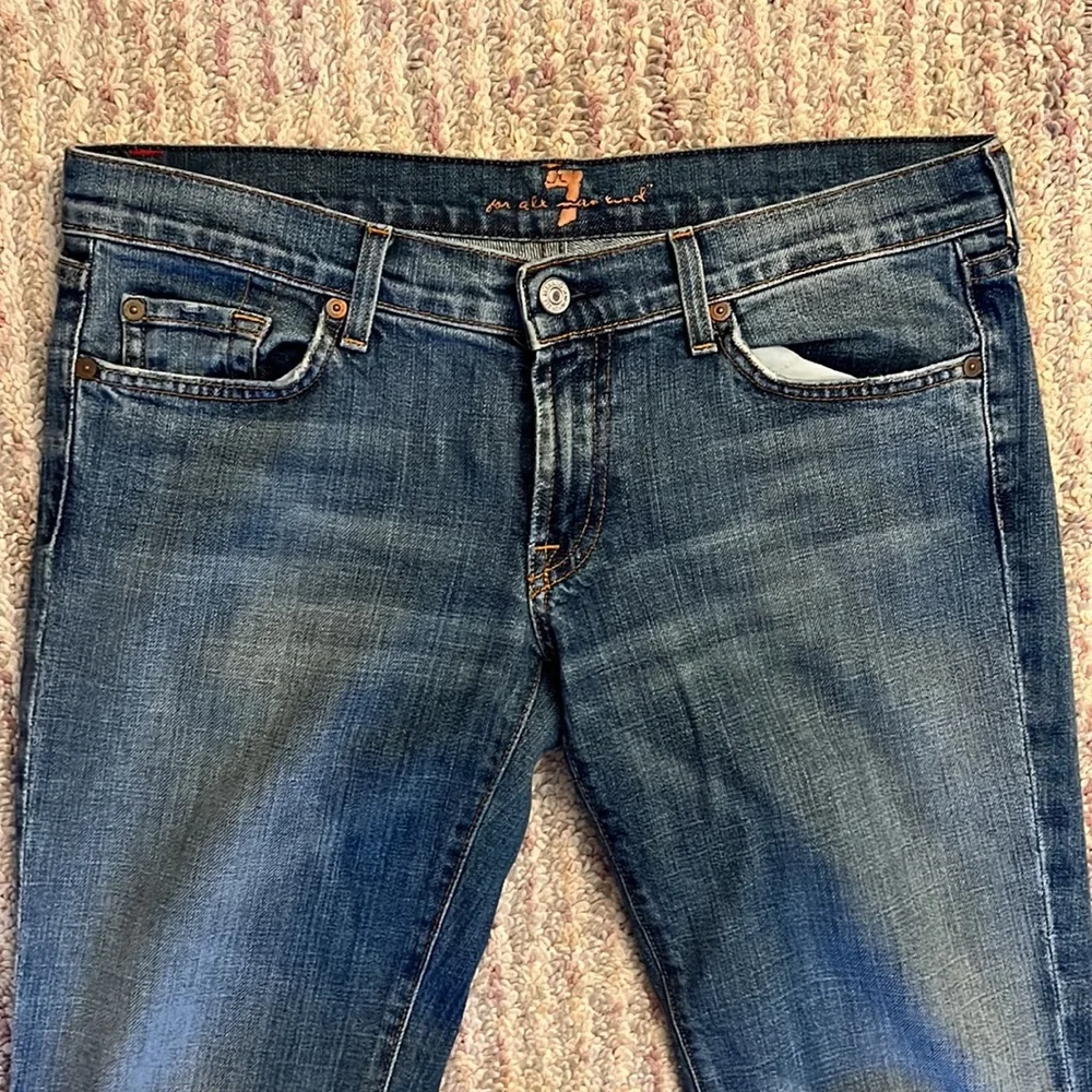 7 For All Mankind Blue Boot Cut Jeans with Vintage Fading - Picture 2 of 6